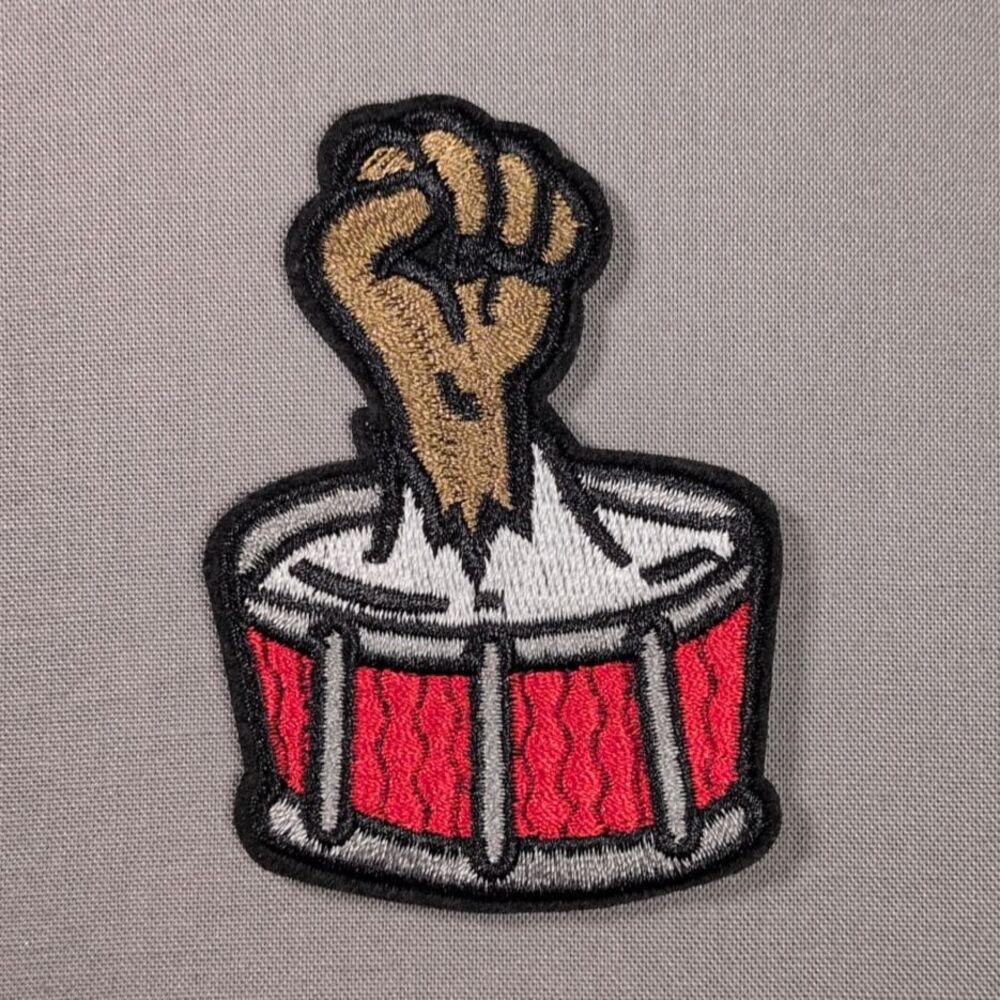 Rocker Busts Through Drum Iron On Patch | Rock Music Patch